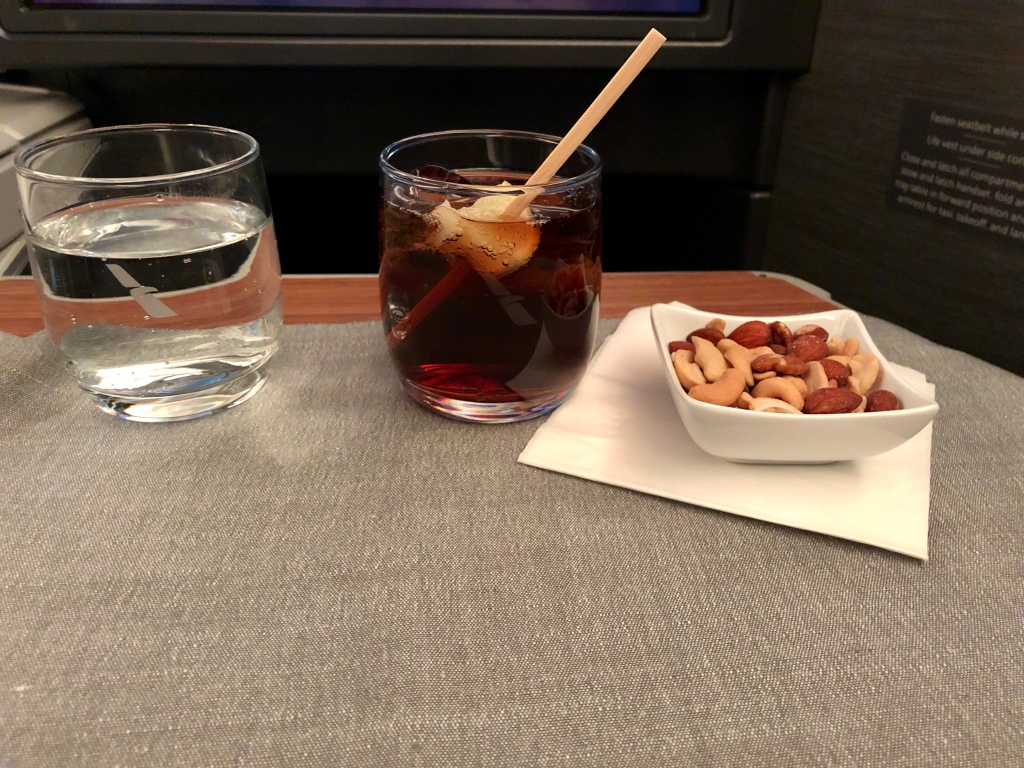 First drink service and warm mixed nuts